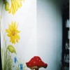 photo of kids mural with giant flowers and mushrooms