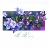 picture of apple blossoms painted in watercolor on a greeting card